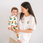 Woman wearing the Miffy white breastfeeding T-shirt with embroidered tulip and nursing zips
