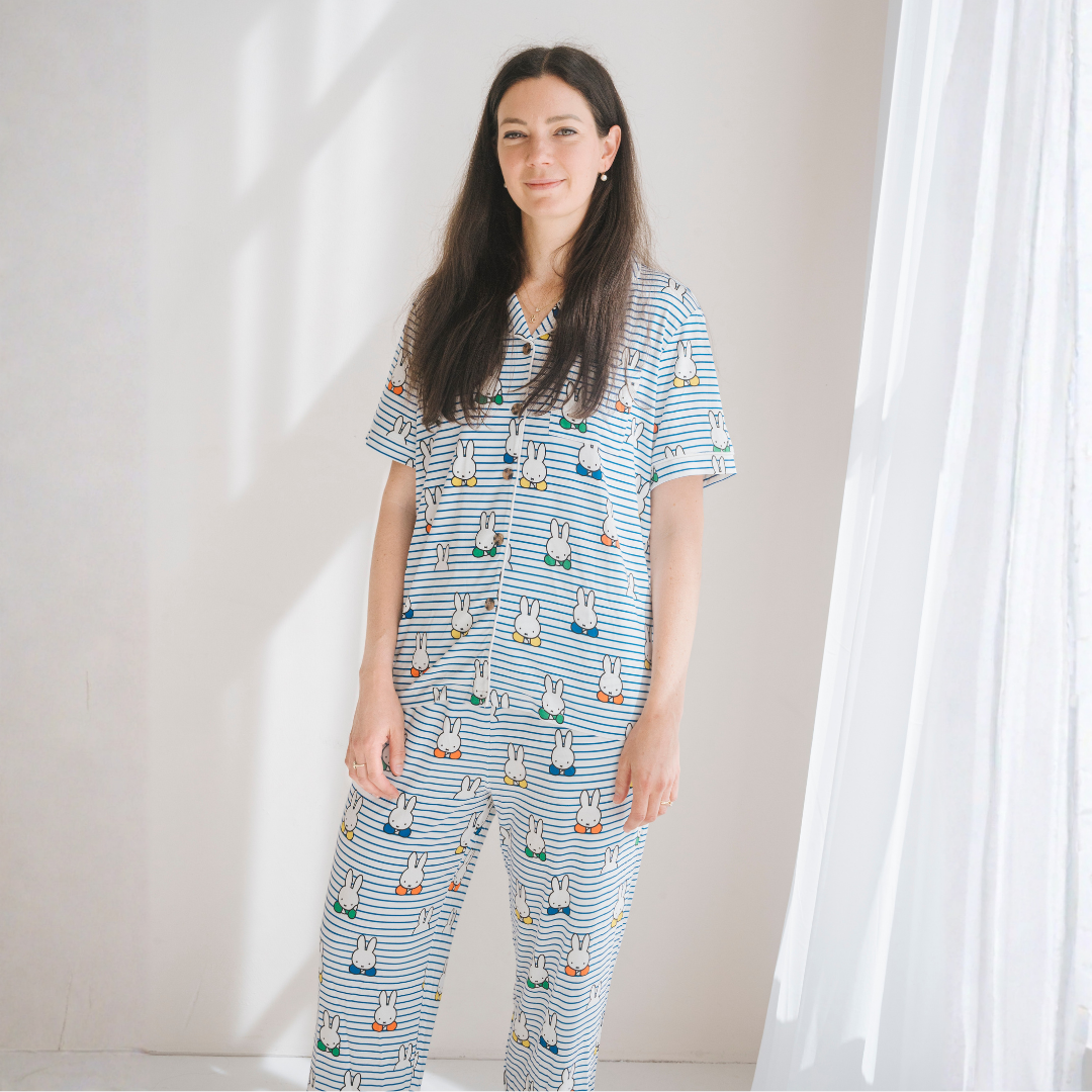 Woman wearing the Ladies Miffy Peek-a-Boo Blue bamboo pyjama set