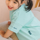 Übergroßes Kinder-T-Shirt in Mint mit Frida-Papagei