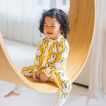 Bébé portant la grenouillère en bambou Hello Yellow ZIPSTER x Miffy