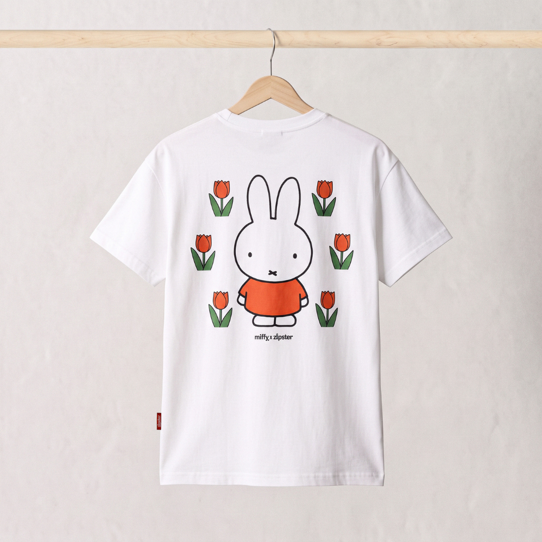Back view of the Miffy white breastfeeding T-shirt, with a large Miffy among tulips print